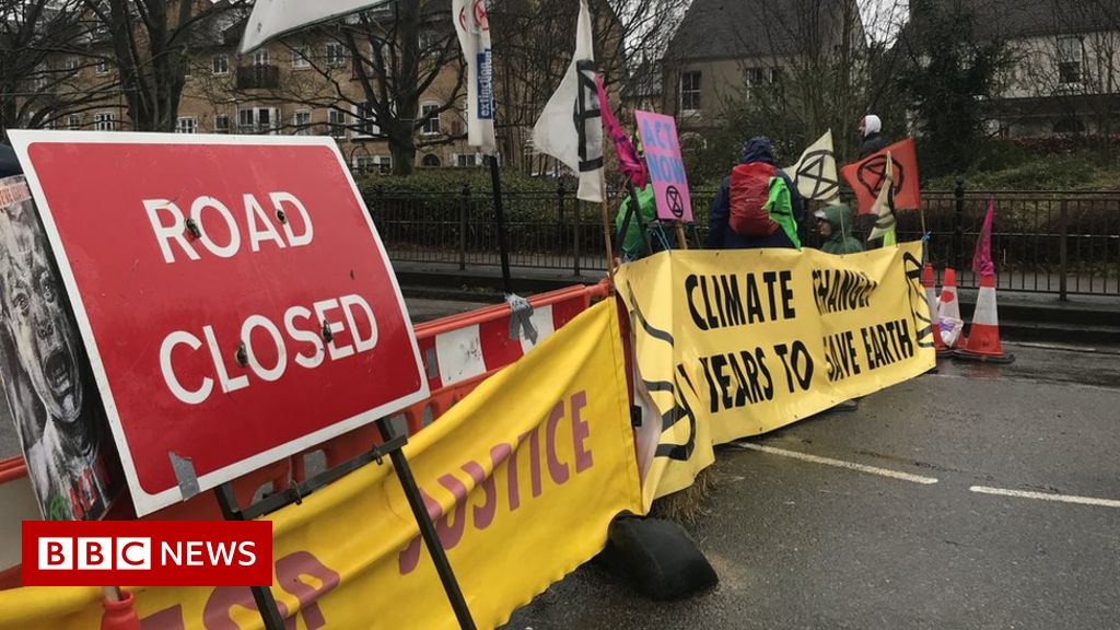 Extinction Rebellion activists block Cambridge roads