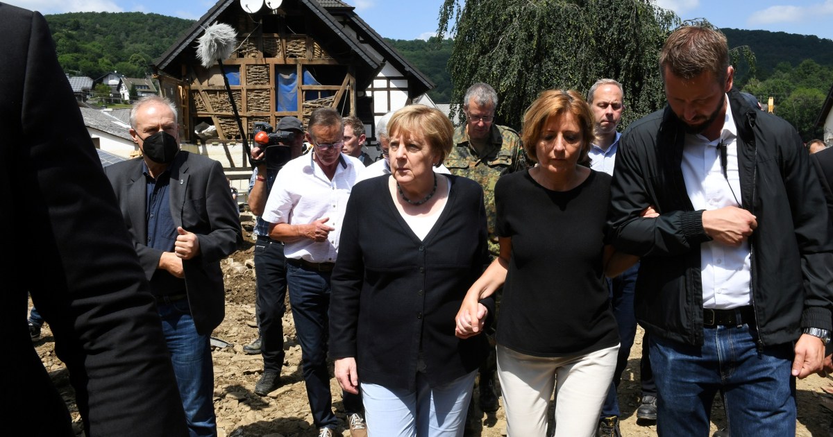 Merkel calls for climate change action as she surveys deadly flood damage