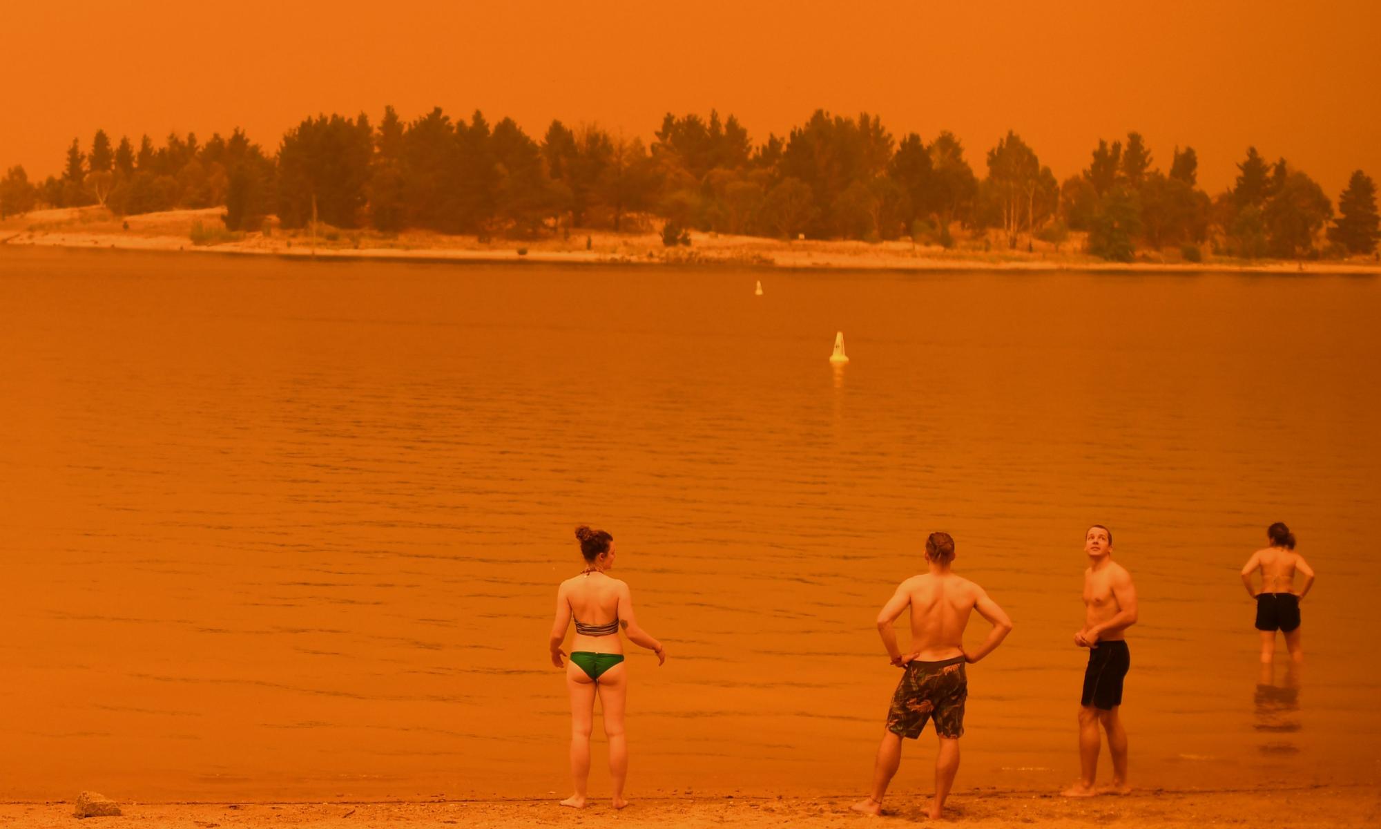 Fire raining on beaches, red skies and a billion animals killed: a different Australian summer | Brigid Delaney