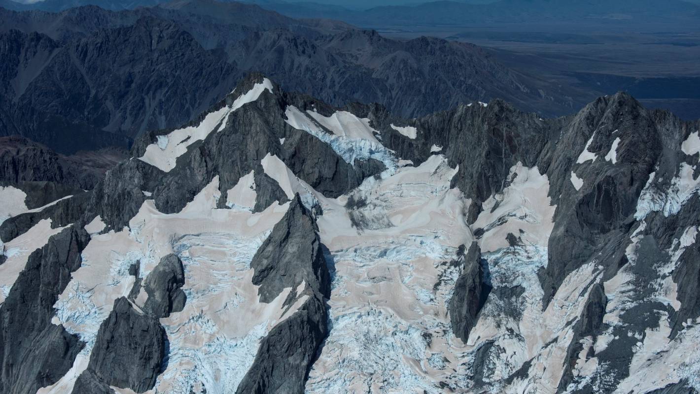 Climate crisis in one: Shrinking glaciers spattered with bushfire ash