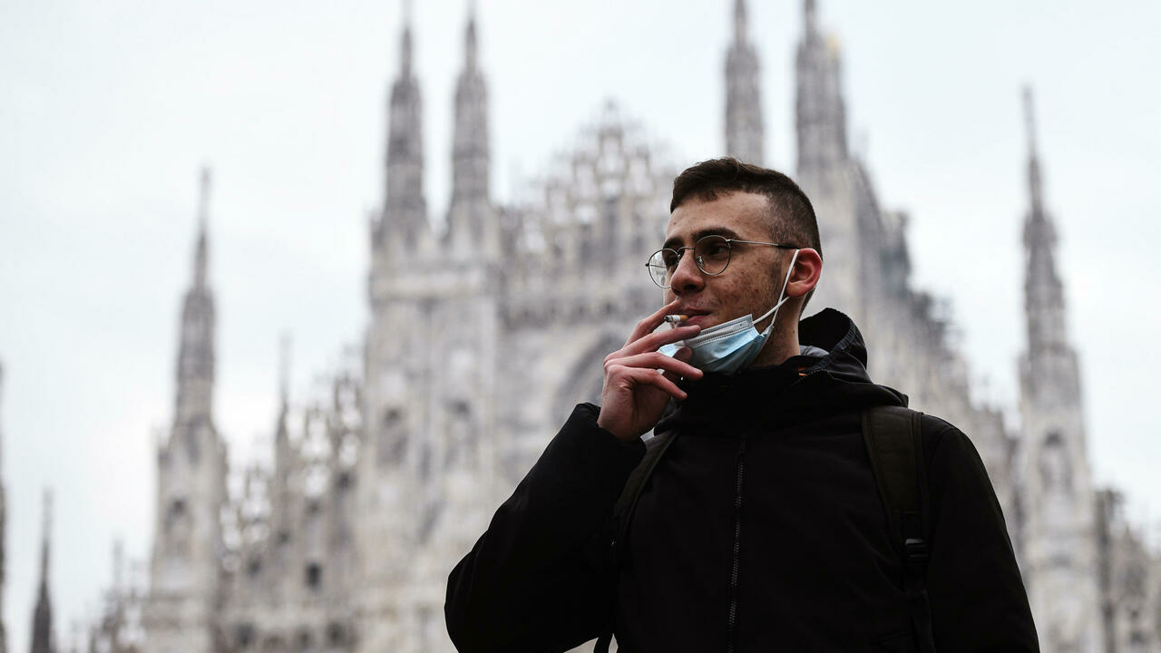 Choked-up Milan takes smoking ban outside