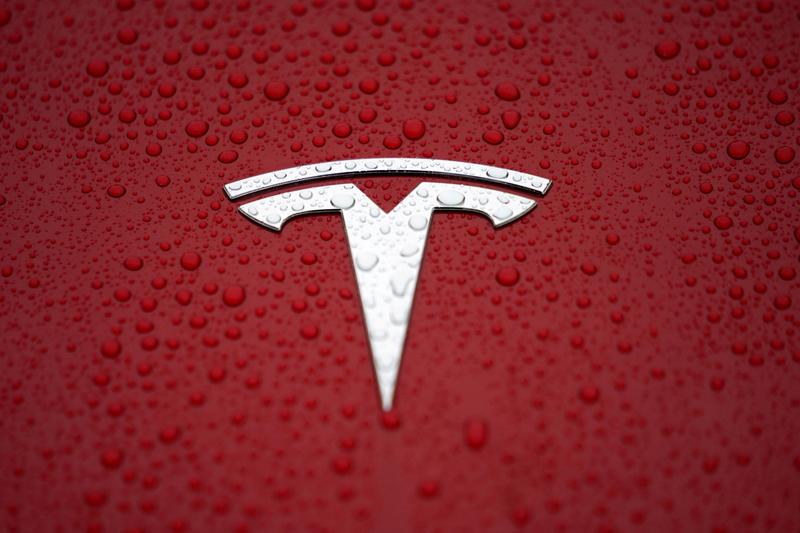 Tesla plans to produce electric car chargers in China, document shows - Reuters India