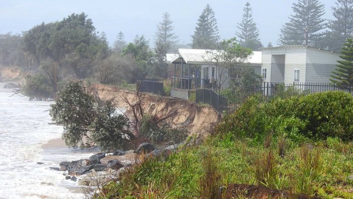 Beach erosion leaves Newcastle cabins at risk