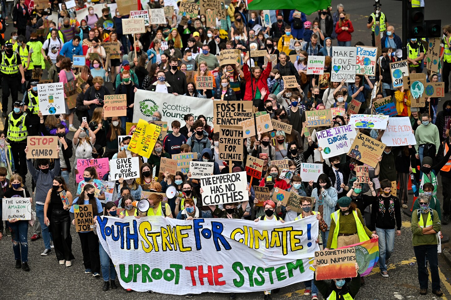 Young people around the world follow Greta Thunberg's call to rally over climate in first major protest since pandemic