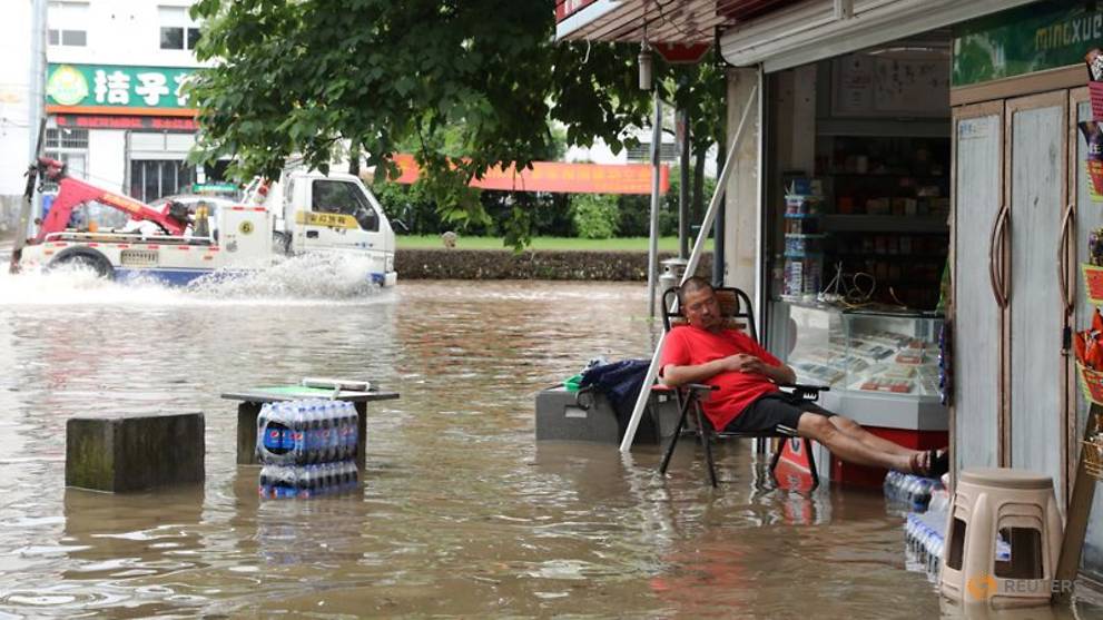China braces for more rainstorms over weekend, climate change blamed