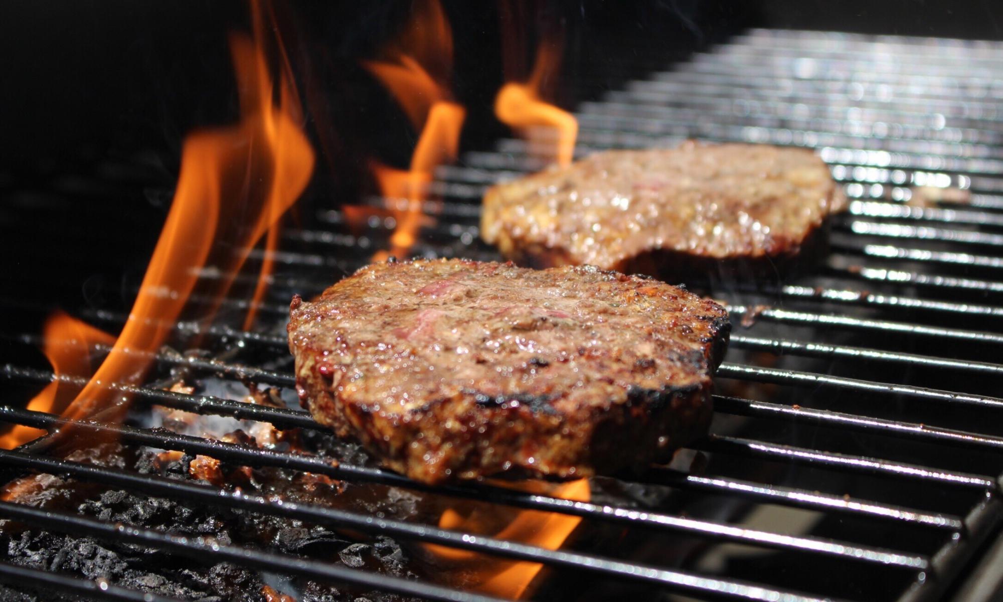 Cut meat consumption to two burgers a week to save planet, study suggests